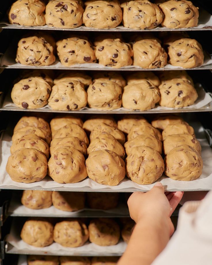 Racks of fresh cookie dough ready for the oven at Doonie's